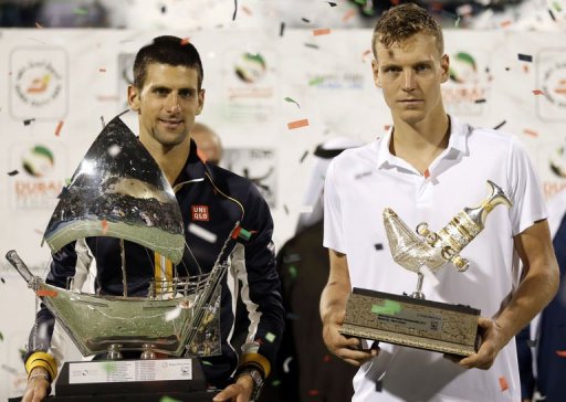 Serbia's Novak Djokovic (L) and Czech Republic's Tomas Berdych pose with their trophies, March 2, 2013 Serbia's Novak Djokovic (L) and Czech Republic's Tomas Berdych pose with their trophies, March 2, 2013