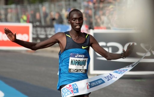 Kenya's Vincent Kipruto is pictured crossing the finish line at the Paris Marathon on April 5, 2009 Kenya's Vincent Kipruto is pictured crossing the finish line at the Paris Marathon on April 5, 2009