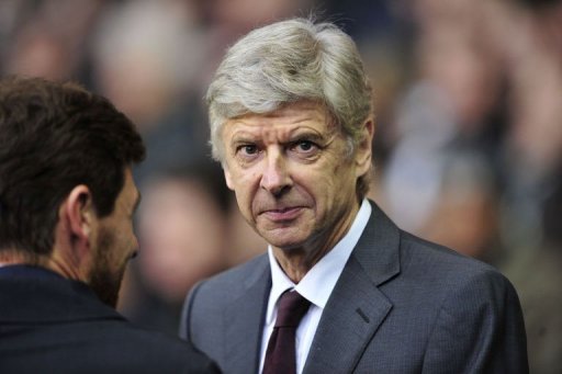 Arsenal manager Arsene Wenger looks on at White Hart Lane in north London on March 3, 2013 Arsenal manager Arsene Wenger looks on at White Hart Lane in north London on March 3, 2013