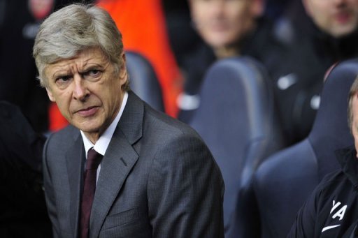 Arsenal manager Arsene Wenger looks on at White Hart Lane in north London on March 3, 2013 Arsenal manager Arsene Wenger looks on at White Hart Lane in north London on March 3, 2013