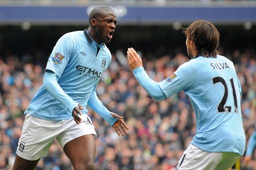 Manchester City's Yaya Toure (L) and David Silva are pictured during their match against Chelsea on February 24, 2013 Manchester City's Yaya Toure (L) and David Silva are pictured during their match against Chelsea on February 24, 2013