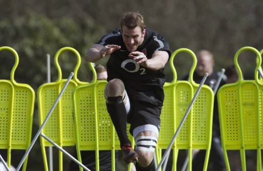 England's flanker Tom Croft jumps through obstacles during a training session in Bagshot on March 15, 2012 England's flanker Tom Croft jumps through obstacles during a training session in Bagshot on March 15, 2012