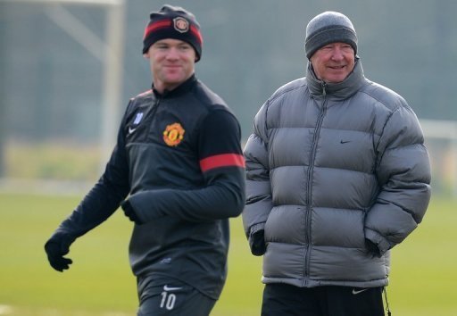 Man United manager Alex Ferguson (R) and Wayne Rooney attend a training session in Manchester on March 4, 2013 Man United manager Alex Ferguson (R) and Wayne Rooney attend a training session in Manchester on March 4, 2013