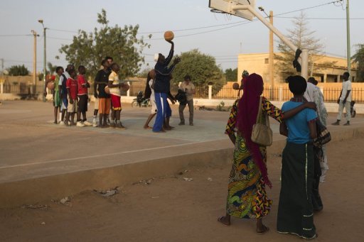 Youngsters play basketball at the former Youngsters play basketball at the former