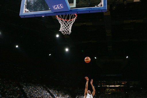 File illustration photo of a basketball player making a shot File illustration photo of a basketball player making a shot