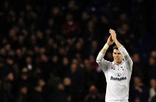Tottenham Hotspur's Gareth Bale thanks the fans at White Hart Lane in north London on March 3, 2013 Tottenham Hotspur's Gareth Bale thanks the fans at White Hart Lane in north London on March 3, 2013