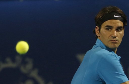 Roger Federer hits a backhand return during a match at ATP Dubai Open, in the Gulf emirate, on March 1, 2013 Roger Federer hits a backhand return during a match at ATP Dubai Open, in the Gulf emirate, on March 1, 2013