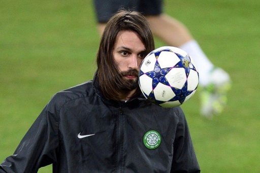Celtic forward Giorgios Samaras looks at the ball during a training session in Turin on March 5, 2013 Celtic forward Giorgios Samaras looks at the ball during a training session in Turin on March 5, 2013