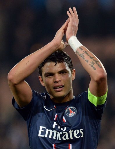 Paris Saint-Germain's Thiago Silva celebrates on March 6, 2013 at the Parc-des-Princes stadium in Paris Paris Saint-Germain's Thiago Silva celebrates on March 6, 2013 at the Parc-des-Princes stadium in Paris