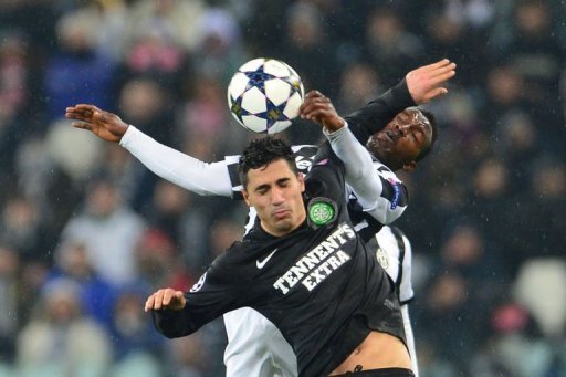 Celtic's Beram Kayal fights for the ball with Juventus' Kwadwo Asamoah (back) on March 6, 2013 in Turin Celtic's Beram Kayal fights for the ball with Juventus' Kwadwo Asamoah (back) on March 6, 2013 in Turin