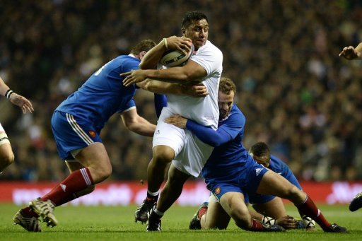 England's Mako Vunipola (C) fights off the attentions of the French defence at Twickenham on February 23, 2013 England's Mako Vunipola (C) fights off the attentions of the French defence at Twickenham on February 23, 2013