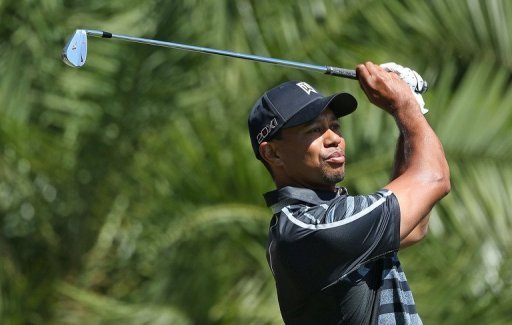 Tiger Woods hits his tee shot on the 15th hole on March 7, 2013 at the Trump Doral Golf Resort & Spa in Miami, Florida Tiger Woods hits his tee shot on the 15th hole on March 7, 2013 at the Trump Doral Golf Resort & Spa in Miami, Florida