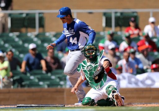 Humberto Cota of Mexico catches the ball late as Anthony Rizzo of Italy safely scores March 7, 2013 in Scottsdale Humberto Cota of Mexico catches the ball late as Anthony Rizzo of Italy safely scores March 7, 2013 in Scottsdale