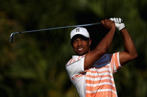 Tiger Woods of the US tees off on the 13th hole on March 8, 2013 in Doral, Florida Tiger Woods of the US tees off on the 13th hole on March 8, 2013 in Doral, Florida