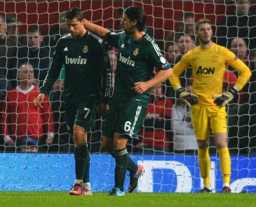 Real Madrid beat Manchester United 2-1 at Old Trafford on March 5, 2013 to reach the next round of the Champions League Real Madrid beat Manchester United 2-1 at Old Trafford on March 5, 2013 to reach the next round of the Champions League