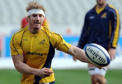 David Pocock passes the ball on November 26, 2010 at the Stade de France in Saint-Denis, France David Pocock passes the ball on November 26, 2010 at the Stade de France in Saint-Denis, France
