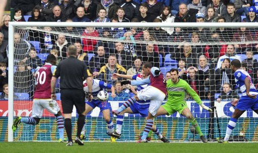 Aston Villa's English striker Gabriel Agbonlahor (C) scores at the Madejski Stadium in Reading, on March 9, 2013 Aston Villa's English striker Gabriel Agbonlahor (C) scores at the Madejski Stadium in Reading, on March 9, 2013
