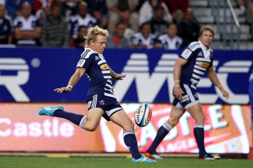 Stormers' Joe Pietersen (L) clears the ball during a Super 15 Rugby match in Cape Town on March 16, 2012 Stormers' Joe Pietersen (L) clears the ball during a Super 15 Rugby match in Cape Town on March 16, 2012