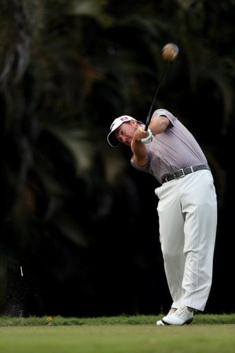 Graeme McDowell of Northern Ireland tees off on the 16th hole on March 9, 2013 in Doral, Florida Graeme McDowell of Northern Ireland tees off on the 16th hole on March 9, 2013 in Doral, Florida