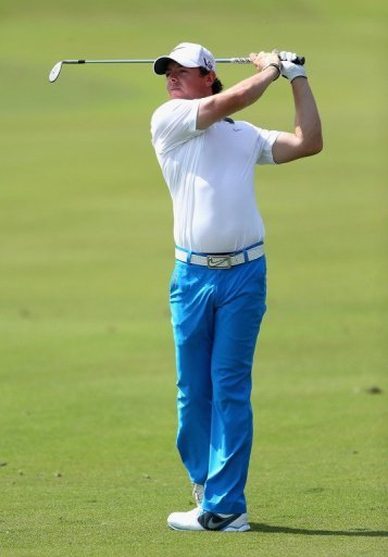 Rory McIlroy of Northern Ireland plays his second shot into the third green on March 9, 2013 in Doral, Florida Rory McIlroy of Northern Ireland plays his second shot into the third green on March 9, 2013 in Doral, Florida