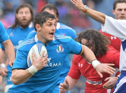 Italy's Edoardo Gori runs with ball during their Six Nations match against Wales, in Rome, on February 23, 2013 Italy's Edoardo Gori runs with ball during their Six Nations match against Wales, in Rome, on February 23, 2013