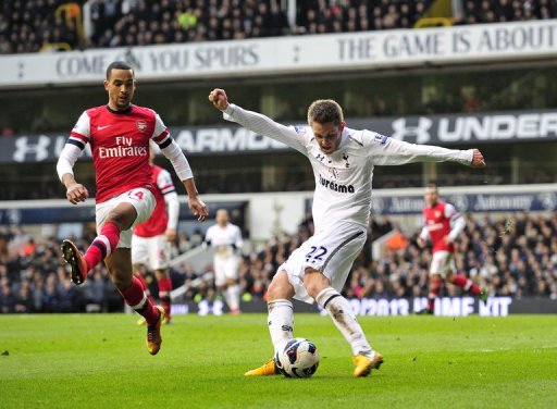 Tottenham midfielder Gylfi Sigurdsson takes a shot on goal against Arsenal on March 3, 2013 Tottenham midfielder Gylfi Sigurdsson takes a shot on goal against Arsenal on March 3, 2013