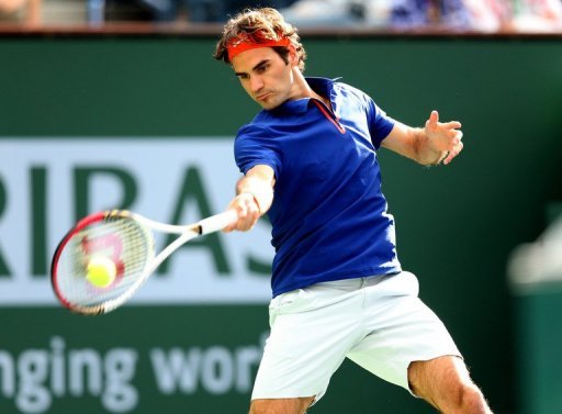 Roger Federer returns to Denis Istomin at Indian Wells on March 9, 2013 Roger Federer returns to Denis Istomin at Indian Wells on March 9, 2013