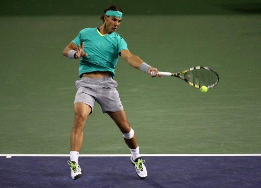 Rafael Nadal hits a return to Ryan Harrison at the BNP Paribas Open at Indian Wells on March 9, 2013 Rafael Nadal hits a return to Ryan Harrison at the BNP Paribas Open at Indian Wells on March 9, 2013