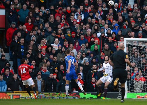 Manchester United's Javier Hernandez (L) scores the first goal at Old Trafford on March 10, 2013 Manchester United's Javier Hernandez (L) scores the first goal at Old Trafford on March 10, 2013