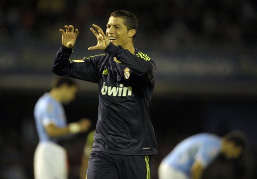Real Madrid's Cristiano Ronaldo celebrates after scoring at the Balaidos Stadium in Vigo, on March 10, 2013 Real Madrid's Cristiano Ronaldo celebrates after scoring at the Balaidos Stadium in Vigo, on March 10, 2013
