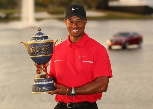 Tiger Woods poses with the Gene Sarazen Cup on March 10, 2013 in Doral Tiger Woods poses with the Gene Sarazen Cup on March 10, 2013 in Doral