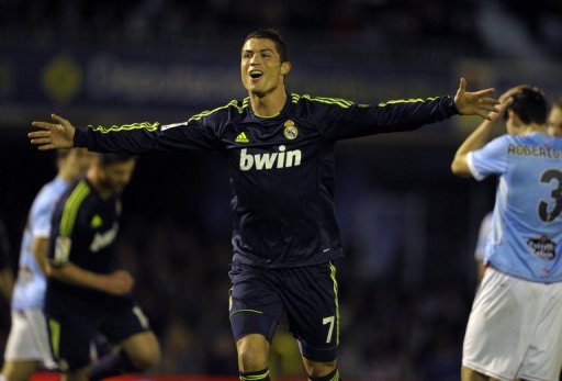 Real Madrid's Cristiano Ronaldo celebrates after scoring during their match against Celta Vigo on March 10, 2013 Real Madrid's Cristiano Ronaldo celebrates after scoring during their match against Celta Vigo on March 10, 2013