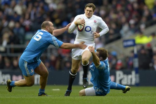 England full-back Alex Goode (C) is tackled by Italy's Davide Giazzon (L) at Twickenham on March 10, 2013 England full-back Alex Goode (C) is tackled by Italy's Davide Giazzon (L) at Twickenham on March 10, 2013