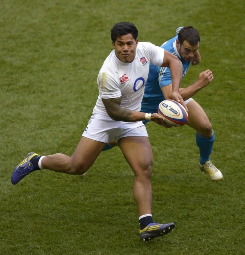 England centre Manu Tuilagi runs with the ball in front of Italy centre Gonzalo Canale at Twickenham on March 10, 2013 England centre Manu Tuilagi runs with the ball in front of Italy centre Gonzalo Canale at Twickenham on March 10, 2013