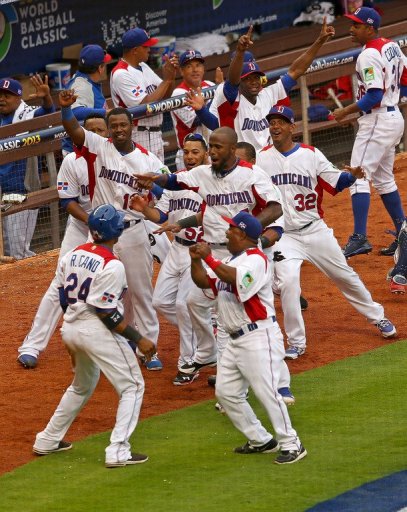 The Dominican Republic celebrate the winning run in the World Baseball Classic against Italy on March 12, 2013 The Dominican Republic celebrate the winning run in the World Baseball Classic against Italy on March 12, 2013