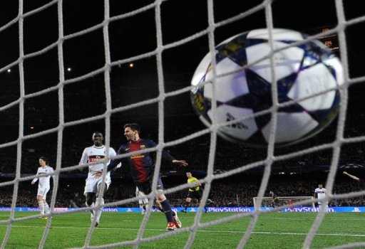 Barcelona's Lionel Messi celebrates scoring against AC Milan at Camp Nou in Barcelona on March 12, 2013 Barcelona's Lionel Messi celebrates scoring against AC Milan at Camp Nou in Barcelona on March 12, 2013