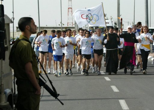 Competitors and church representatives take part in a marathon from Bethlehem to Jerusalem's Old City on April 14, 2005 Competitors and church representatives take part in a marathon from Bethlehem to Jerusalem's Old City on April 14, 2005