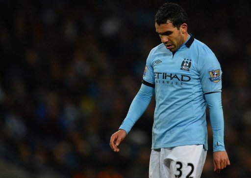 Manchester City's Carlos Tevez reacts at the Etihad Stadium in Manchester, on March 9, 2013 Manchester City's Carlos Tevez reacts at the Etihad Stadium in Manchester, on March 9, 2013