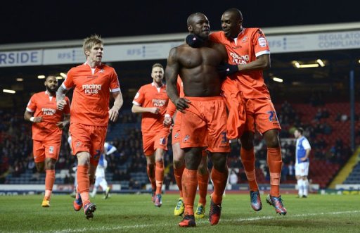 Millwall's Danny Shittu (2nd R) celebrates scoring the opening goal in Blackburn on March 13, 2013 Millwall's Danny Shittu (2nd R) celebrates scoring the opening goal in Blackburn on March 13, 2013