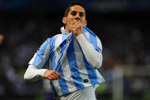 Malaga's Isco celebrates after scoring in Malaga on March 13, 2013 Malaga's Isco celebrates after scoring in Malaga on March 13, 2013