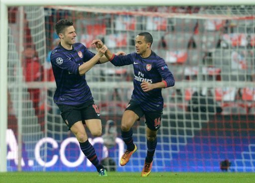 Olivier Giroud (L) and Theo Walcott during the UEFA Champions League clash at Bayern Munich on March 13, 2013 Olivier Giroud (L) and Theo Walcott during the UEFA Champions League clash at Bayern Munich on March 13, 2013