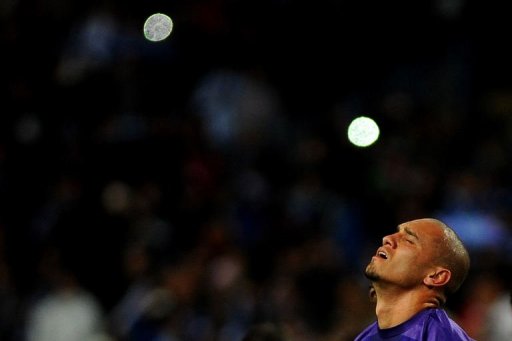 Porto's Maicon reacts after losing at La Rosaleda stadium in Malaga on March 13, 2013 Porto's Maicon reacts after losing at La Rosaleda stadium in Malaga on March 13, 2013