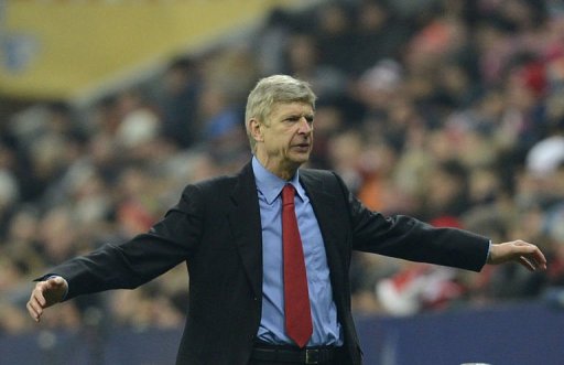 Arsene Wenger reacts in in Munich on March 13, 2013 Arsene Wenger reacts in in Munich on March 13, 2013