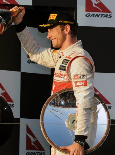 McLaren driver Jenson Button celebrates victory at the Australian Grand Prix in Melbourne on March 18, 2012 McLaren driver Jenson Button celebrates victory at the Australian Grand Prix in Melbourne on March 18, 2012