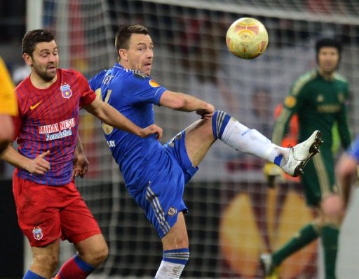 John Terry (R) hooks the ball clear against Steaua Bucharest on March 7, 2013 John Terry (R) hooks the ball clear against Steaua Bucharest on March 7, 2013