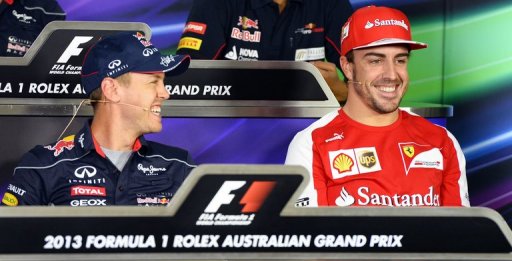 Sebastian Vettel (L) shares a lighter moment with rival Fernando Alonso at a press conference on March 14, 2013 Sebastian Vettel (L) shares a lighter moment with rival Fernando Alonso at a press conference on March 14, 2013