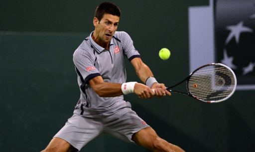 Novak Djokovic of Serbia hits a backhand return against Sam Querrey in Indian Wells, California on March 14, 2013 Novak Djokovic of Serbia hits a backhand return against Sam Querrey in Indian Wells, California on March 14, 2013