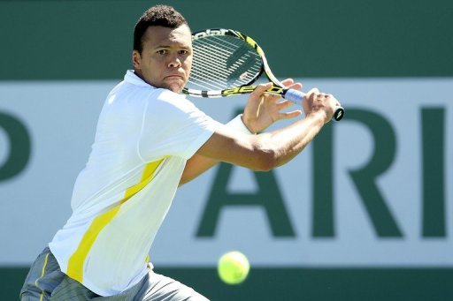 Jo-Wilfried Tsonga of France returns a shot to Milos Raonic 13 in Indian Wells, California, on March 13, 2013 Jo-Wilfried Tsonga of France returns a shot to Milos Raonic 13 in Indian Wells, California, on March 13, 2013