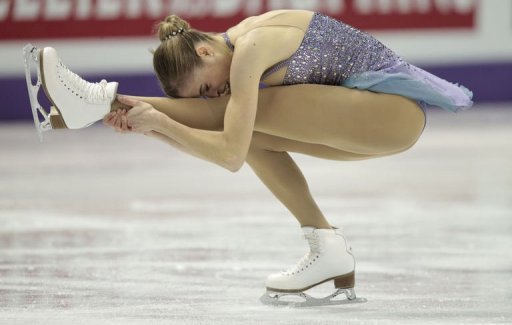 Carolina Kostner skates during the Ladies Short Program at the 2013 World Figure Skating Championships March 14, 2013 Carolina Kostner skates during the Ladies Short Program at the 2013 World Figure Skating Championships March 14, 2013