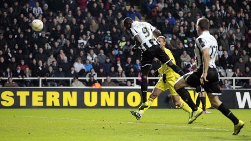 Newcastle's Papiss Cisse (L) scores in the dying minutes of injury time against Anzhi Makhachkala on March 14, 2013 Newcastle's Papiss Cisse (L) scores in the dying minutes of injury time against Anzhi Makhachkala on March 14, 2013